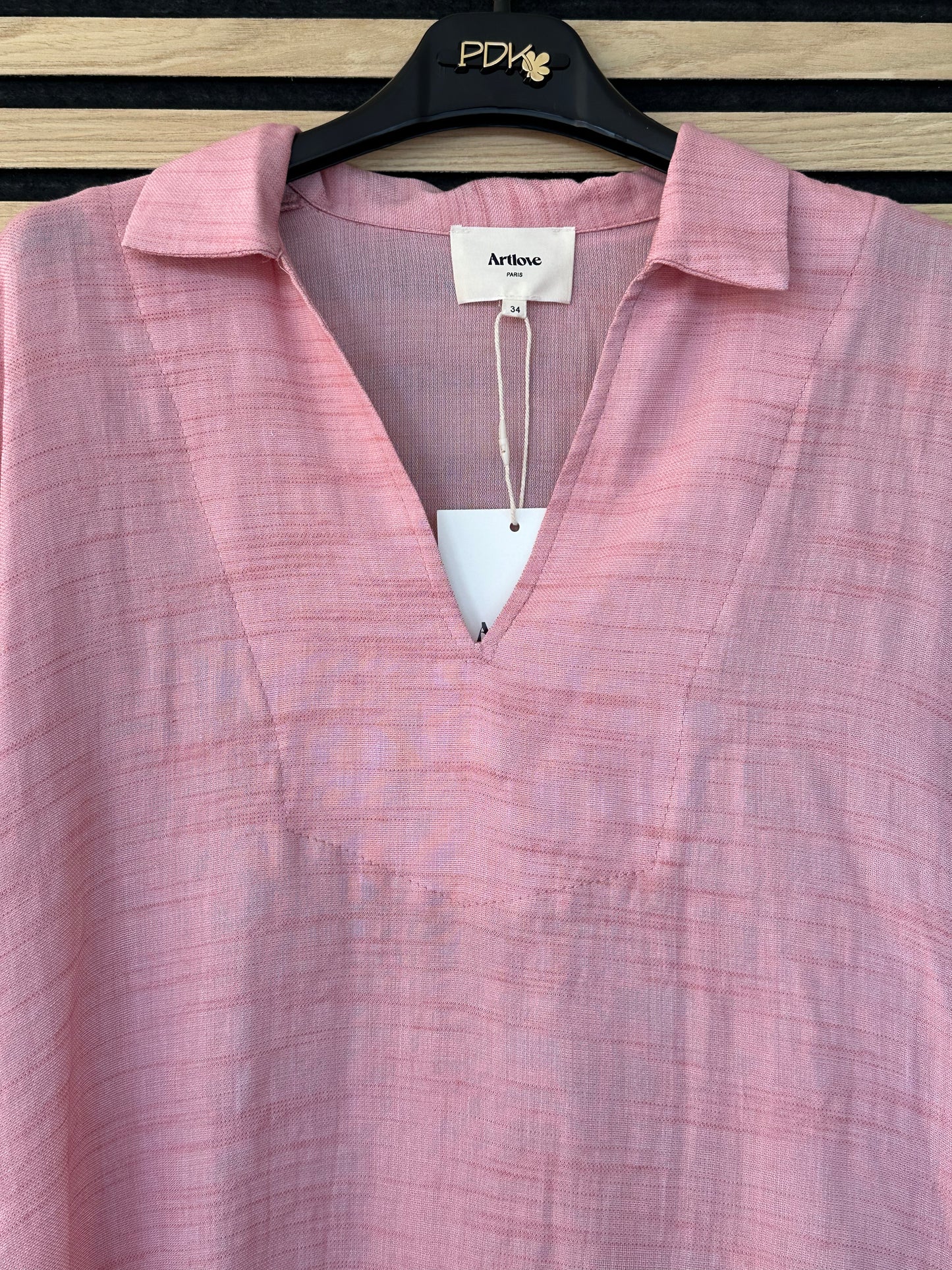 Blusa rosa effetto lino